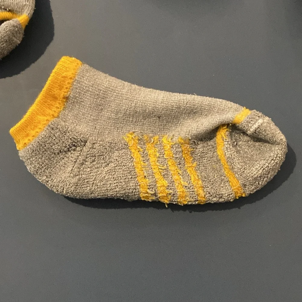 Toddler Boys socks with feet. EUC. Blue,red, yellow, black. 4 pairs